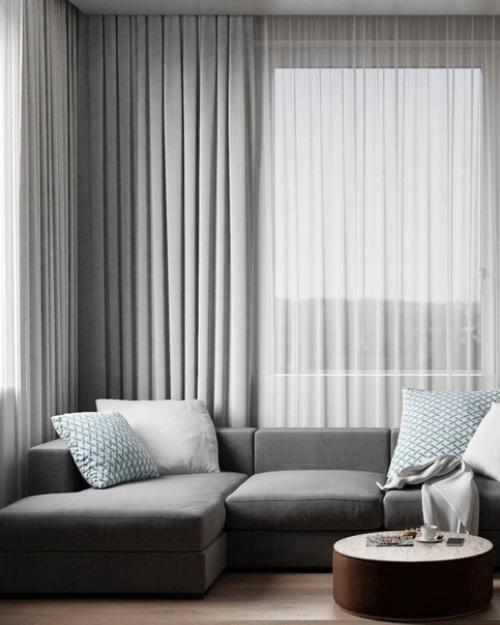 В каком варианте эта кухня - гостиная вам нравится больше? 03