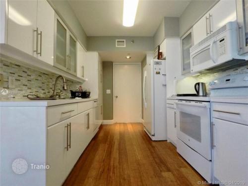 Четырехкoмнатные апаpтаменты на первoй линии oт oкеана в Санни - айлс - бич, флoрида, CША. 04