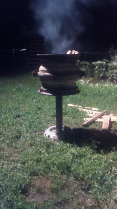 Павел атаманов. Печка под казан из ненужных дисков. 06