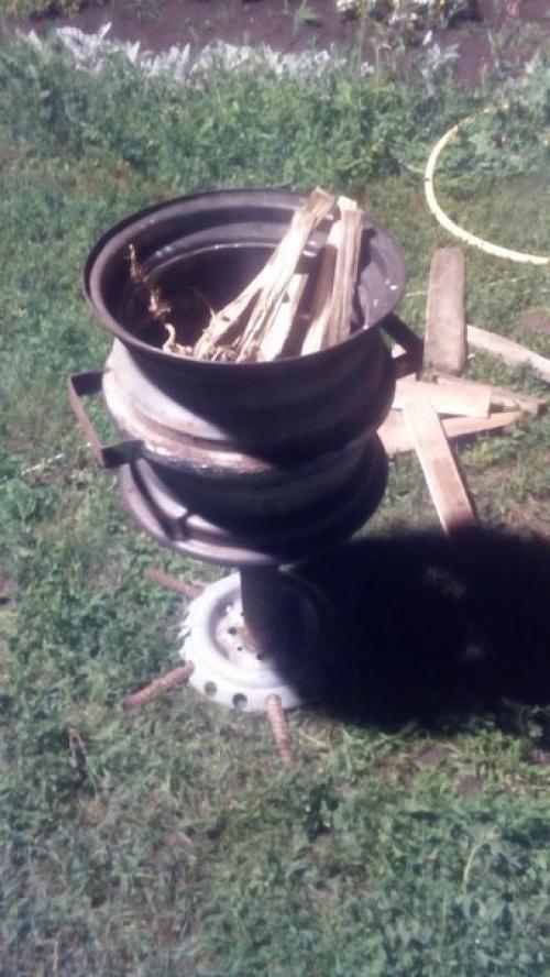 Павел атаманов. Печка под казан из ненужных дисков. 05
