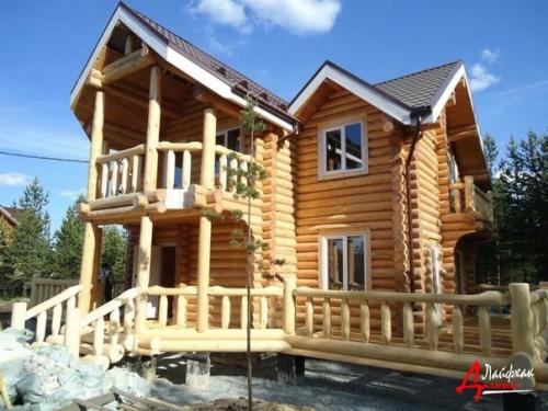 Экстерьер деревянного дома из оцилиндрованного бруса с террасой в г. Архангельск! 02