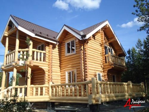 Экстерьер деревянного дома из оцилиндрованного бруса с террасой в г. Архангельск! 01